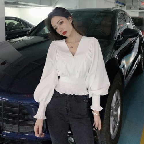  new autumn and winter foreign style V-neck design, waist closing long sleeve shirt, European and American style white navel exposed blouse, female