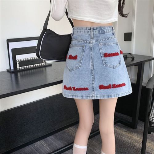 Embroidered denim skirt women's summer 2023 new Korean version pure desire niche slim anti-light a-line skirt tide