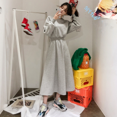 Autumn and winter Korean temperament long sleeve large size slim big swing waist long sweater dress women's fashion