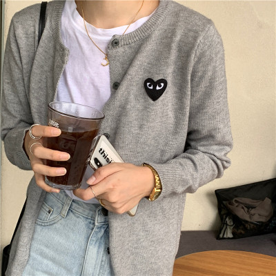 2020 spring and Autumn New Korean peach heart knitted cardigan women's long sleeve short slim bottomed sweater small coat