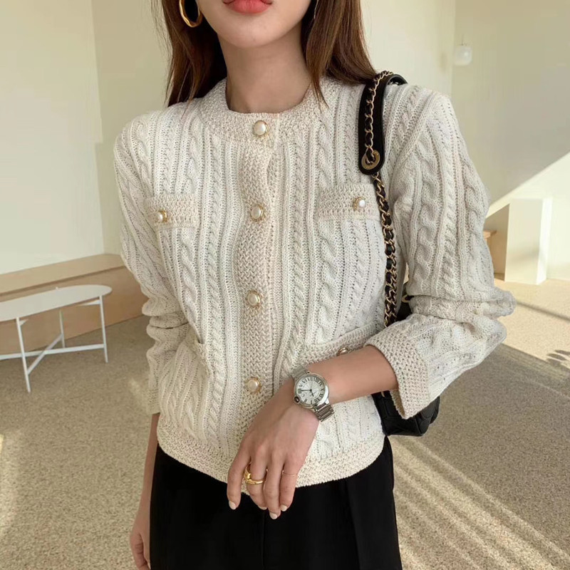 Autumn and winter Korean version small fragrance temperament round neck slim fitting pearl button twist cardigan sweater for women