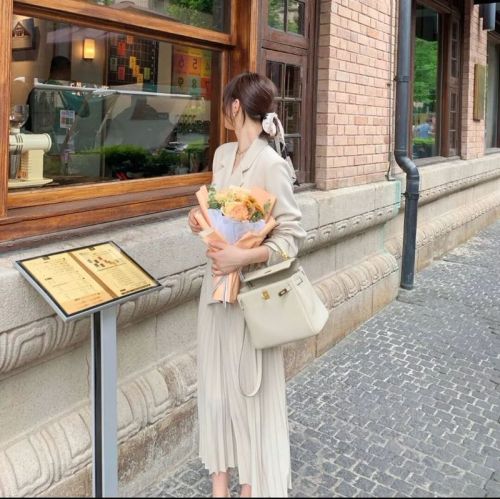 Early autumn new French temperament suit coat dress women's super fairy solid color Lapel skirt trend