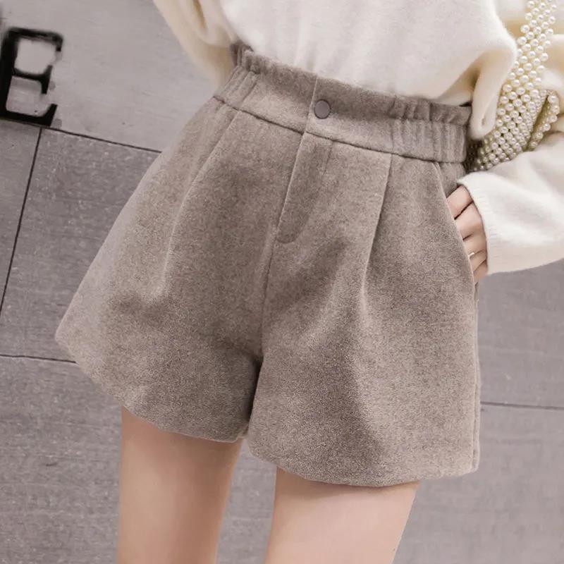 Woolen shorts women's 2021 new autumn and winter foreign style, wearing high waist A-shaped boots and pants, Nizi black wide leg pants