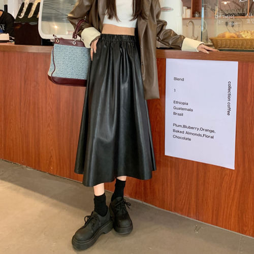 Real price ~ the new Korean PU leather skirt is simple and versatile. The high waist is thin and elastic. The middle and long skirt for women