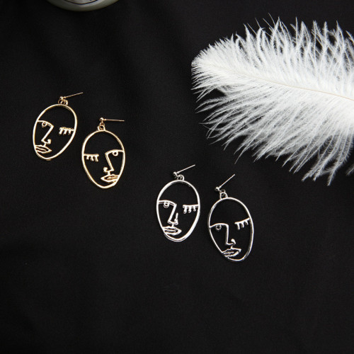 Korean version of the new personality face hollow Earrings facial eyes elliptical earpin Earrings