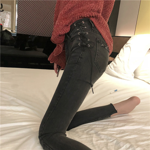 Actual shooting of the new Korean version of Loose-headed sweater with large sleeves and side-tied elastic jeans with small feet