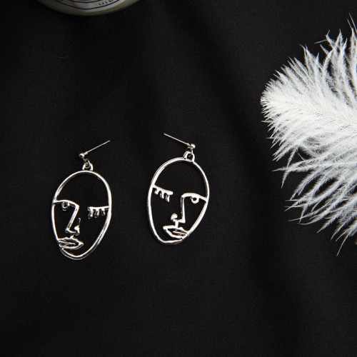 Korean version of the new personality face hollow Earrings facial eyes elliptical earpin Earrings