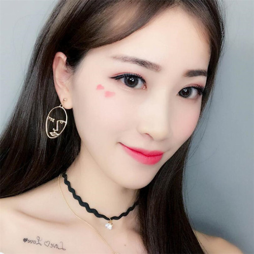 Korean version of the new personality face hollow Earrings facial eyes elliptical earpin Earrings