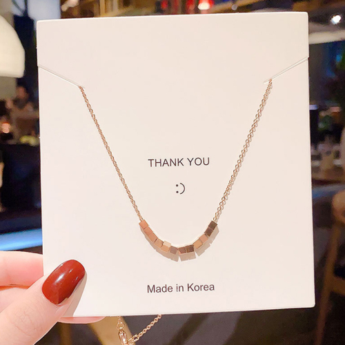 Japan and South Korea three-dimensional small block clavicle chain temperament rose gold necklace women's titanium steel plated 18K short style versatile