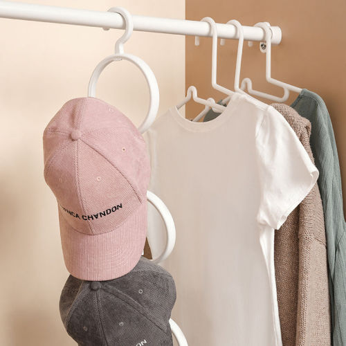 Hang a hat, store artifact, arrange a hanger, hang a hook on the wall behind the door, hang a hat hanger on the wall of the bedroom and dormitory