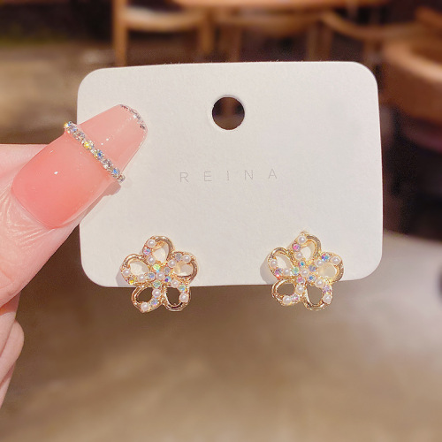 Real shot silver needle Korean version hollow out diamond inlaid small flower earrings female style minority Earrings