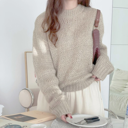 Super soft milk whistling solid color hollow out slightly transparent seahorse hair round neck bubble sleeve sweater