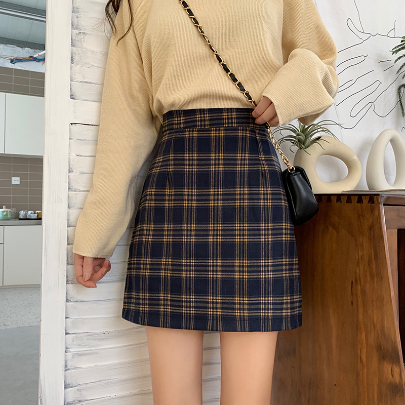 Real shooting real price 2022 spring plaid skirt women's high waist A-line skirt light proof short skirt Hip Wrap Skirt