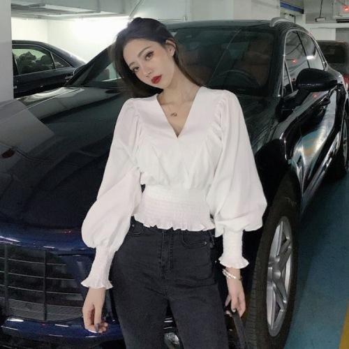 2021 new autumn and winter foreign style V-neck design, waist closing long sleeve shirt, European and American style white navel exposed blouse, female