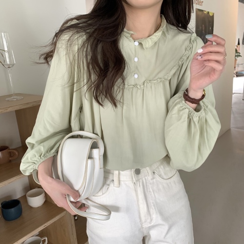 Real shooting and real price new Korean version fungus edge loose Bubble Sleeve Shirt Top Women