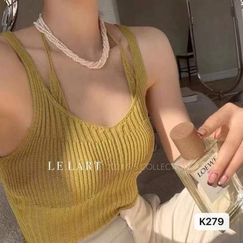 Solid color fake two-piece slim net red knitted vest women's fashion hanging neck French suspender top design