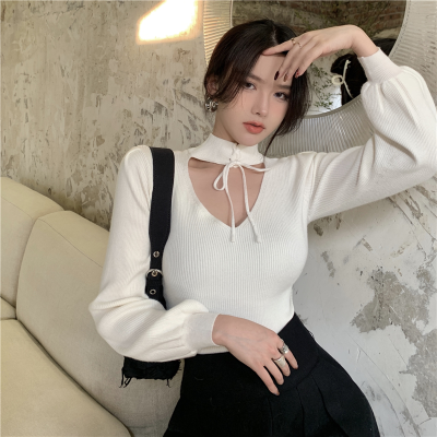 Autumn new style bubble sleeve sweater design sense V-neck hollow out hanging neck short sweater long sleeve blouse women
