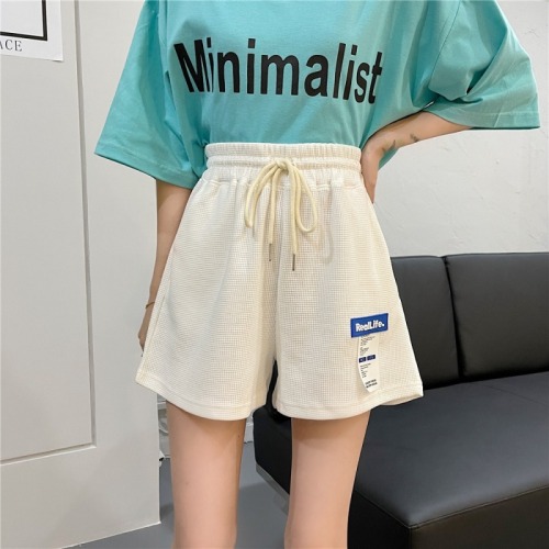 Real shot 2022 summer label waffle casual shorts women's loose and versatile elastic high waist and versatile wide leg hot pants