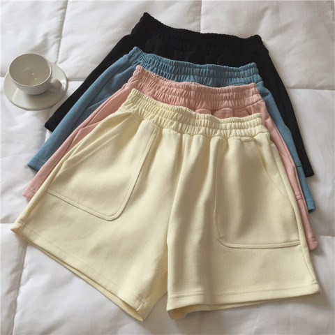 Casual solid color sports shorts women walking out of the street, high waist, thin, loose wide leg hot pants