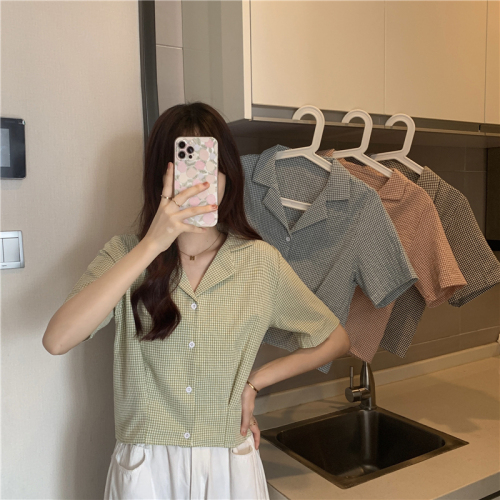 Real price ~ New Korean plaid shirt in summer, loose, irregular and versatile top