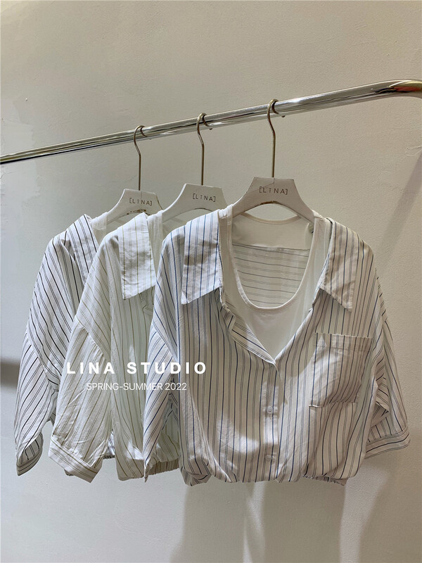 Two piece shirt with vertical stripe