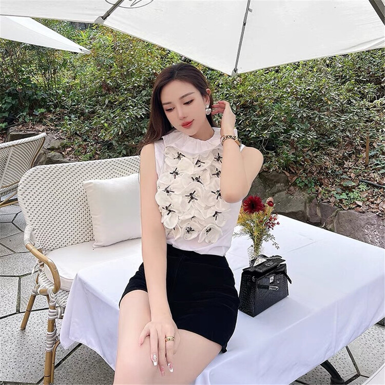 New year in early spring! [pop & Road] net red temperament lotus leaf collar versatile flower vest 9125# JJ