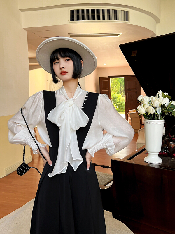 New year in early spring! [rong'er family] Korean pearl temperament high-grade strap skirt 30636# hjy