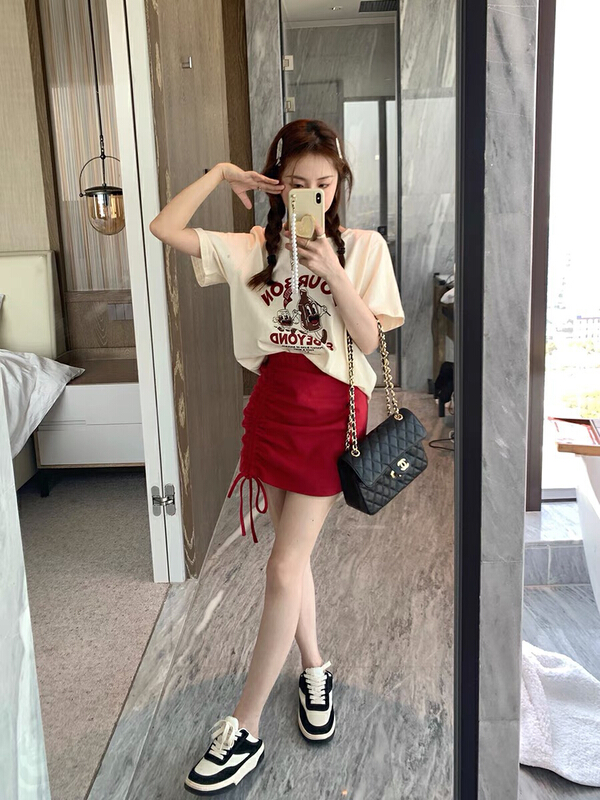 [x · h studio] American cartoon printed short sleeved T-shirt + drawstring design half skirt suit (suit only) 3033# ozq