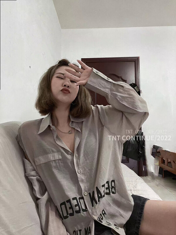 [cont # T-shirt with two letters printed on the shoulder]