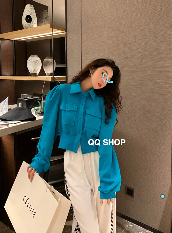 goods in stock! New year in early spring! [QQ shop] Korean version simple fashion bubble sleeve pocket loose short coat 99007# ozq