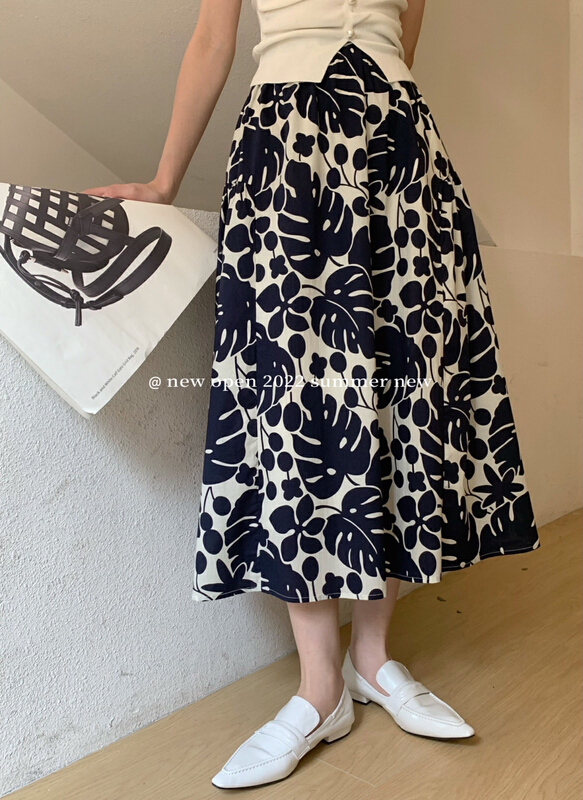 [new open] temperament retro print Korean versatile medium length skirt xq22666# zxl