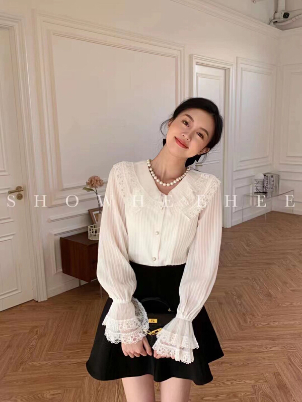 Original price 89.11! New year in early spring! [Xiu Xixi] French lady stitched lace Lapel shirt 9059# zxx