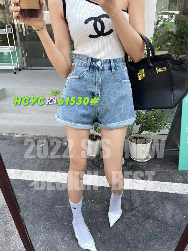 New in early summer! [thgz fairy tale princess] leak waist design pocket sticker leather label denim shorts 61530# JJ