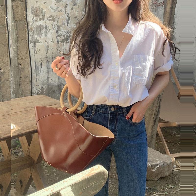 Korean white short sleeved shirt women's new summer design sense of minority shirt loose lazy casual thin