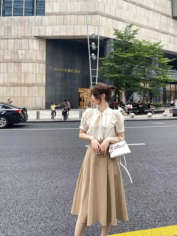 [Kiki studio] temperament fashion shirt + slim skirt suit 6073\hjy