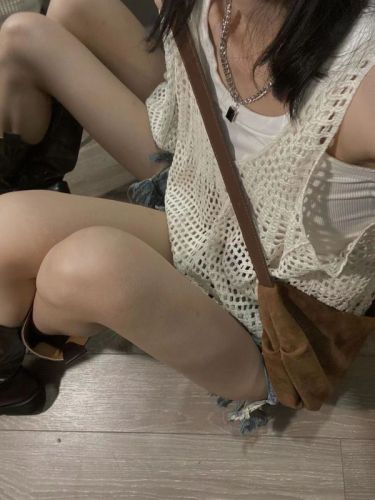 Korean hollow out knitted suspender vest women's new summer design sense of minority loose outer wearing short sleeveless top