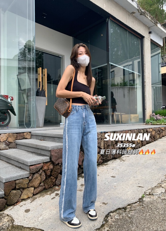 [suxinlan /youmo] Korean version stitched rough edge loose fitting jeans 35355\cqw