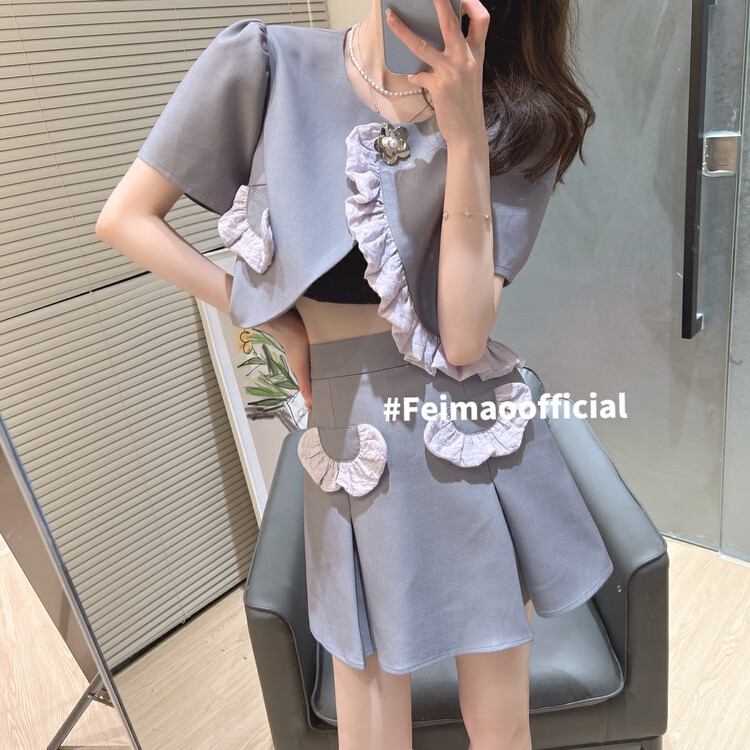 In early summer! [Feimao Philippine cat] fashion short coat + Korean girls' skirt set ym-7173\lsl
