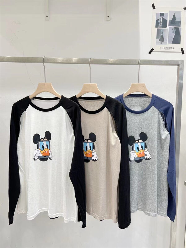 [td] color blocked cartoon printed long sleeved sunscreen shirt t005073# XJ