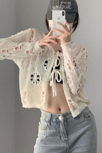 Take photos of early autumn wearing round neck, versatile, super fairy hollow out knitting, cardigan top, summer clothes, pure style