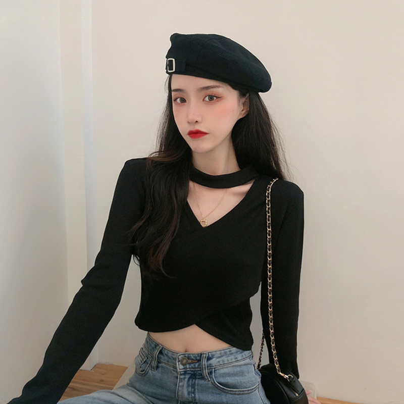 The new design is careful machine tops, halter neck, crossover, navel, slim long-sleeved knitted sweaters for women