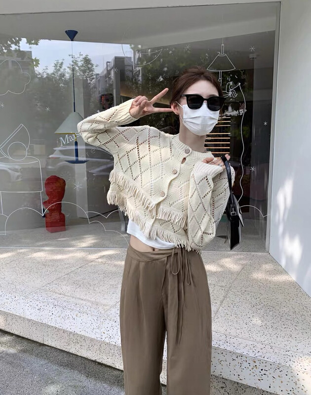 New in early autumn! [SAVAGE] Korean version of the heavy industry design hollow layered stitching tassel single-breasted knitted cardigan E9111# WPL