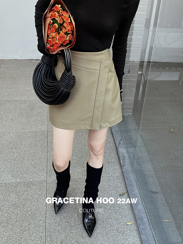 [GRACETINA HOO] Piece-style staggered waist head shows thin all-match skirt imported textured PU leather BQ6273