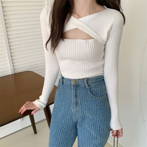 Design sense hollow long-sleeved knitted sweater women's 2022 spring and autumn careful machine slimming slim V-neck pullover apricot top