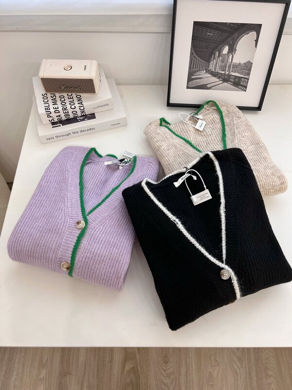 Autumn is new! [Yi Xun] Korean version of loose and thin V-neck long-sleeved knitted cardigan 0320# HYY