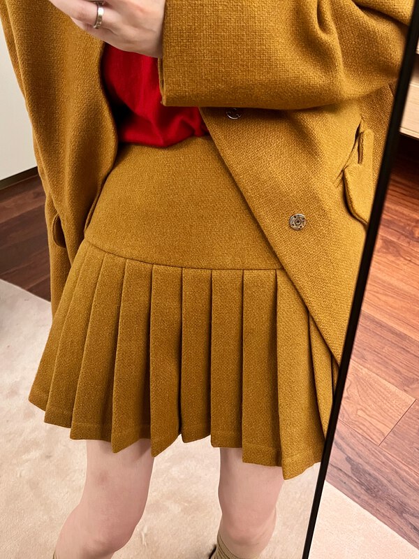 【UNITY】Winter new small short skirt female ins age-reducing a-line pleated skirt 221007018# CQW