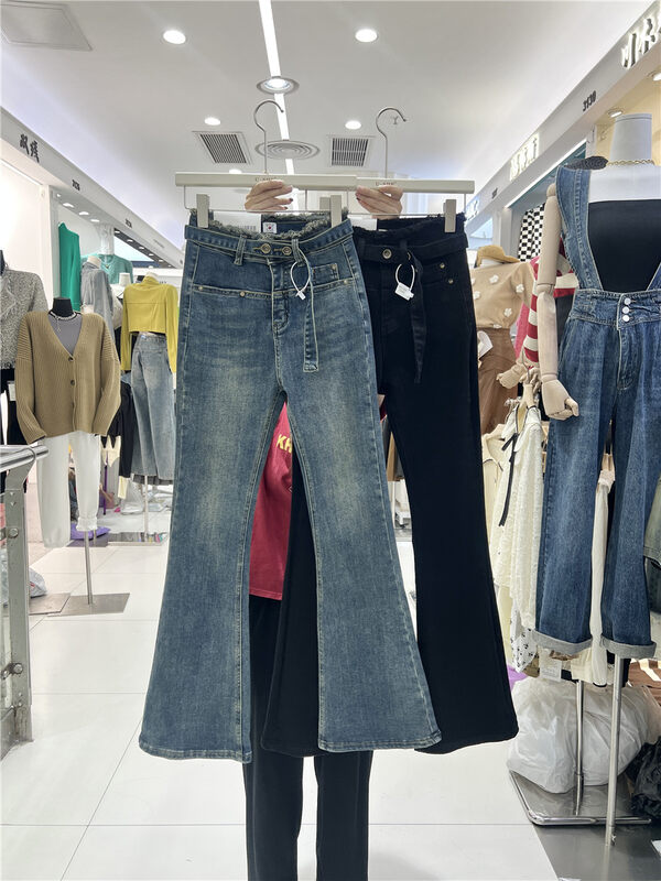 New in winter! [U.SHE] raw edge micro-flare temperament jeans 62033# JJ
