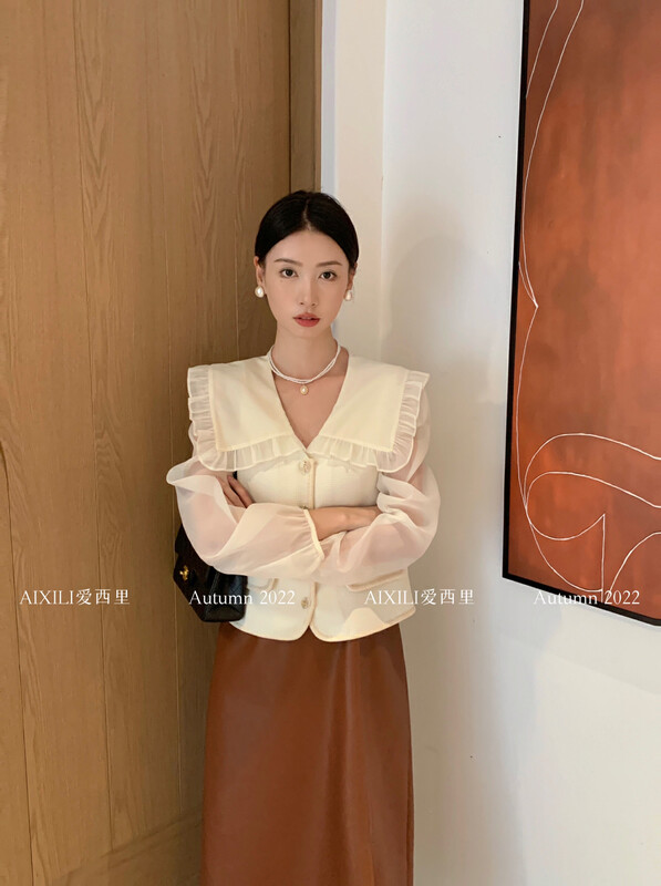 [AIXILI Aisili] Lotus leaf collar with chiffon sleeves stitching fake two-piece solid color shirt shirt single-breasted 7291