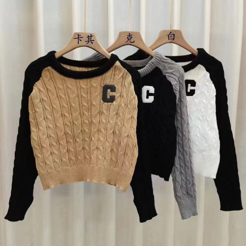 Splicing knitted sweater Korean version 2022 autumn new style pullover lazy style raglan sleeves short sweater women