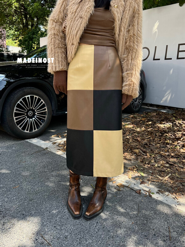 [Osha MADEINOST] Autumn and winter new retro big-name color-blocking PU leather skirt 87335